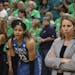 Minnesota Lynx forward Maya Moore (23) and head coach Cheryl Reeve waited to leave the court as Los Angeles celebrated their championship.