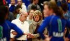 Coach Kathy Gillen (right) leads Eagan, the top-ranked volleyball team in the Class 3A coaches' poll, against rival Lakeville South on Thursday in a b