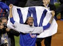 Chicago Cubs' Carl Edwards celebrates after Game 7 of the Major League Baseball World Series against the Cleveland Indians Thursday, Nov. 3, 2016, in 
