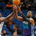 Gorgui Dieng, left, sticks to opponents’ big men; next up is DeMarcus Cousins. Dieng’s versatility enables him to cover players near the basket an