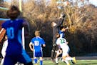 Edina goalkeeper Ethan Ruwe jumped up to make a save during Thursday's game against Minnetonka at Chanhassen High School.
