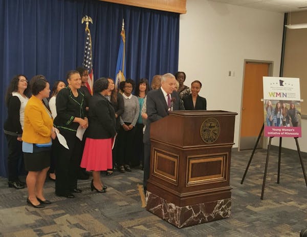 Gov. Mark Dayton announces the Young Women's Initiative of Minnesota in partnership with the nonprofit Women's Foundation of Minnesota.