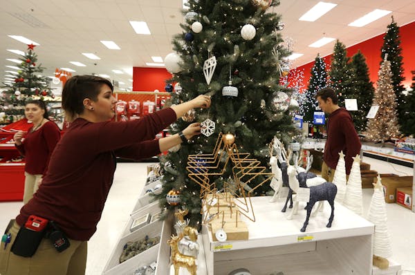 The tree lot at the Roseville Target received a last-minute touch-up by Nina Friis.