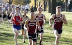 Maple Grove’s Alex Miley, right, set the pace during a cross-country meet Tuesday at Central Park in Brooklyn Park.