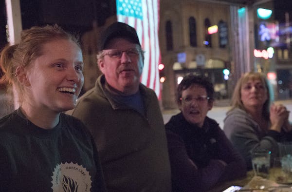 Krissy Becker, Tom Hackworthy, and Kathy Hackworthy watched election results Tuesday night at the Agave Kitchen in Hudson, Wis. Said one Trump support