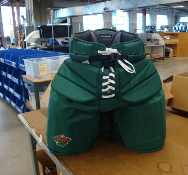 The NHL approved new goalie pants, above, to be introduced at season’s start but endured difficulties that delayed the process.