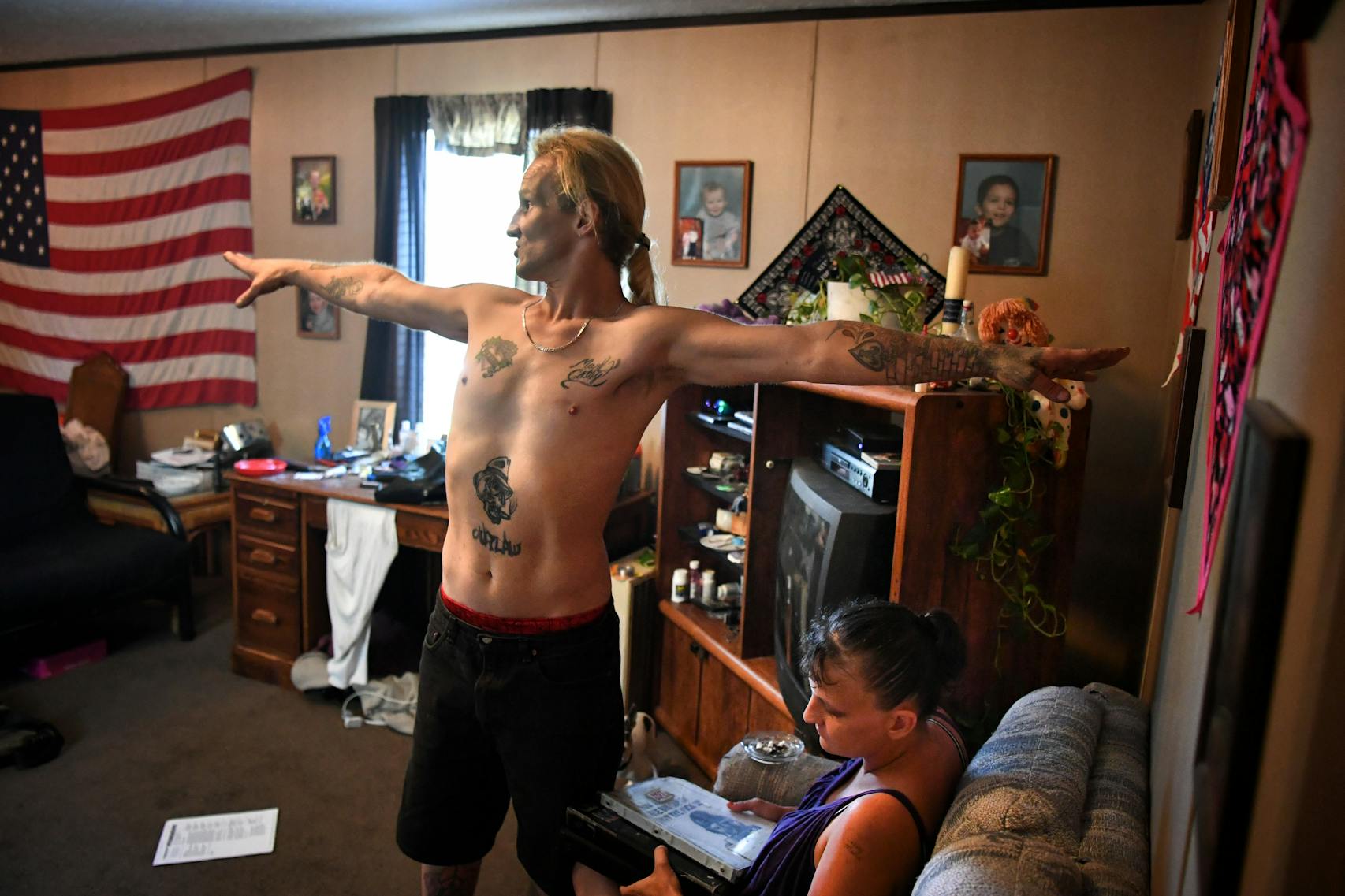 Mark Fenning demonstrated how he could just barely reach from one side of his solitary confinement cell to the other. Fenning and his wife, Cathy, were in their mobile home that they rented this summer in Montevideo, Minn.