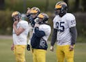 From the left offensive linemen right tackle Ian Bass, right guard Jacob Smith, center Terek Pate and left guard John Allstot during practice at Rosem