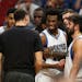 Timberwolves forward Andrew Wiggins (22) beamed as he came off the court and was congratulated by teammates late in the fourth quarter Sunday after pu