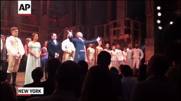VP-Elect Mike Pence gets a message at 'Hamilton'