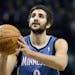 Minnesota Timberwolves guard Ricky Rubio attempts a free-throw in the first half of an NBA basketball game against the Memphis Grizzlies in December 2