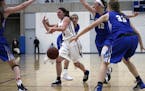 Allie Pickrain (5) drives through traffic in the first half. She finished the game with 17 points in Eastview's 74-48 win over Minnetonka Saturday nig
