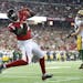 Atlanta Falcons wide receiver Mohamed Sanu catches a touchdown pass from Matt Ryan past Green Bay Packers defender Jake Ryan for a 33-32 victory on Su