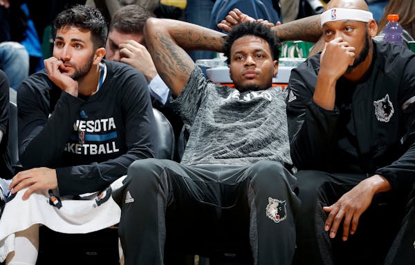 Ricky Rubio, Brandon Rush and Adreian Payne sat on the bench late in the fourth quarter. Utah beat Minnesota by a final score of 112-103. ] CARLOS GON
