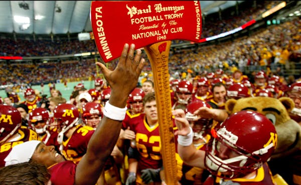 The Gophers football team lifted up Paul Bunyan's Axe in 2003.