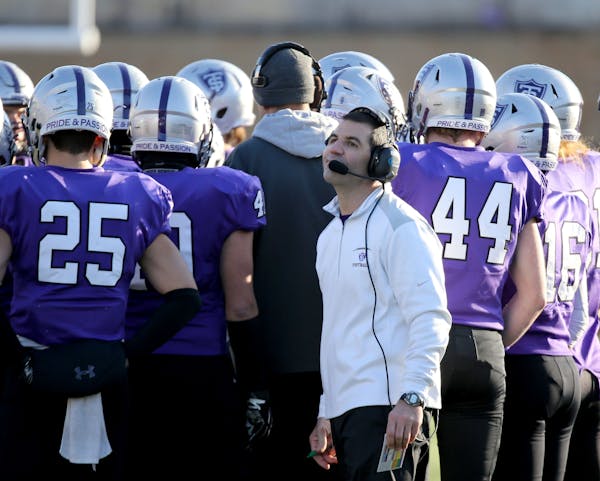 St. Thomas coach Glen Caruso looked on near the end of his team’s 34-31loss to Wisconsin-Oshkosh on Saturday.