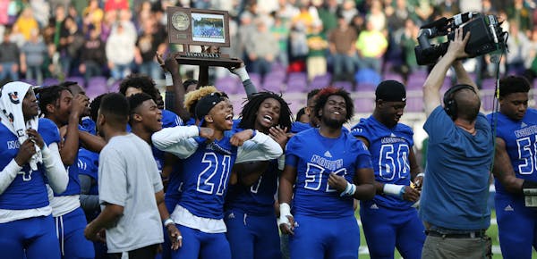 The Minneapolis North Polars celebrated after winning the Class 1A state high school football championship at U.S. Bank Stadium.
