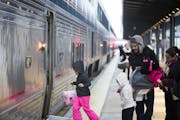 Passengers board the Empire Builder to Chicago at St. Paul's Union Station on Friday. After a drop in 2015, ridership on Amtrak’s Minnesota route su