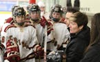 Maple Grove girls' hockey coach Amber Hegland, right, has the Crimson trending up after three consecutive victories. The streak is on the line Tuesday