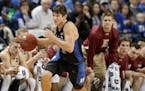 Duke's Grayson Allen (3) brings the ball up the court against Elon in the second half of an NCAA college basketball game in Greensboro, N.C., Wednesda