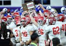 The Elk River players celebrated their Class 5A title after beating Spring Lake Park at the Prep Bowl on Saturday night in Minneapolis.