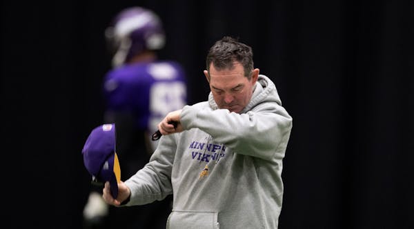 Mike Zimmer wiped his right eye with his sleeve as the Vikings practiced Wednesday at Winter Park.