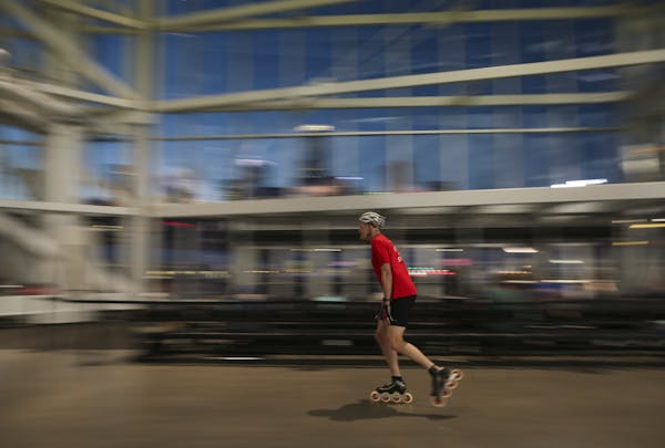 A skater bladed around the concourse Tuesday evening at U.S. Bank Stadium.