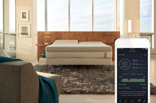 Select Comfort’s new Sleep Number 360 bed, shown with its smartphone app in a photo provided by the company, adjusts to a person’s sleeping patter