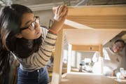 Tenzin Bhuti, 18, worked on a coffee table with her team during Andrew Kastenberg’s women in engineering class at St. Anthony Village High School.