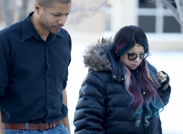 Prince's sister Tyka Nelson, right, arrives at the Carver County Justice Center for a hearing on her brother's estate Thursday, Jan. 12, 2017, in Chas