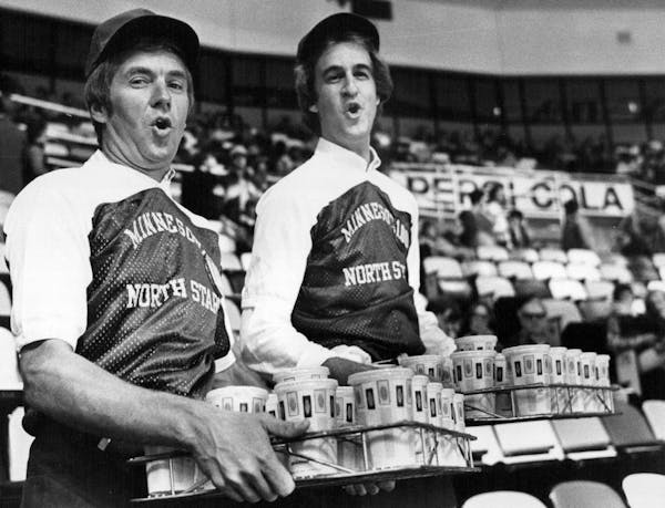 October 12, 1979: Sportscasters Ralph Jon Fritz, left, and Mark Rosen trade the sports desk for selling concessions at a North Stars game.