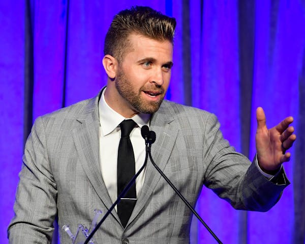 Minnesota Twins second baseman Brian Dozier addressed attendees of the Diamond Awards Thursday night after being awarded the Calvin R. Griffith Award 