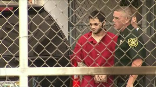 Raw: Florida airport gunman leaves for court