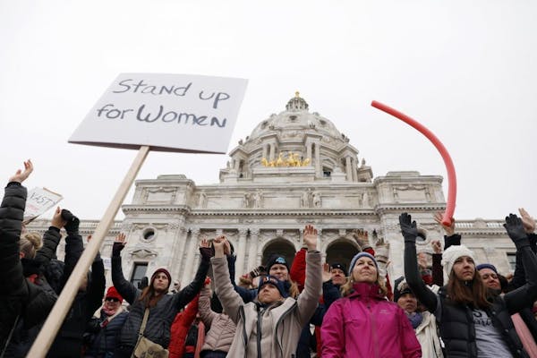 Women's activists and supporters gathered at the State Capitol for the Women's March Minnesota on Saturday in St. Paul, part of a worldwide day of pro