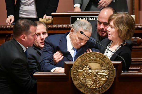 :Gov. Mark Dayton collapsed near the end of his annual State of the State speech Monday night as bystanders rushed to help. They included state Sen. M