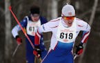 Xavier Mansfield, right, of Spring Lake Park/St. Anthony Village competes during the boy's 5k freestyle race Thursday. ] ANTHONY SOUFFLE � anthony.s