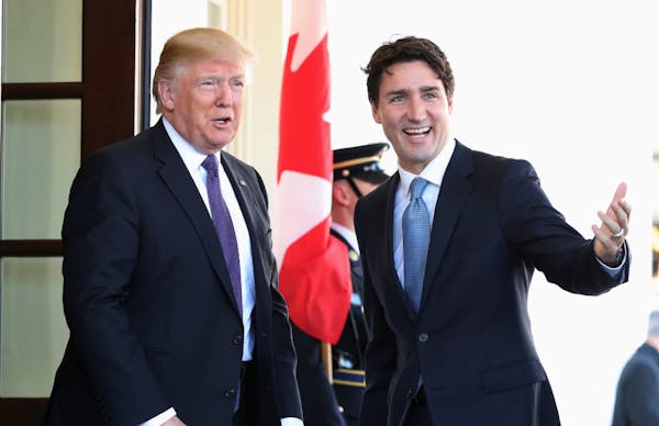 President Donald Trump greets Canadian Prime Minister Justin Trudeau upon his arrival at the White House in Washington, Monday, Feb. 13, 2017