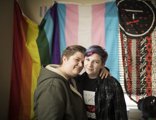 Minneapolis mom Alison Yocom, left, and her 13-year-old son, George, who is transgender, were wary after President Donald Trump this week rescinded fe