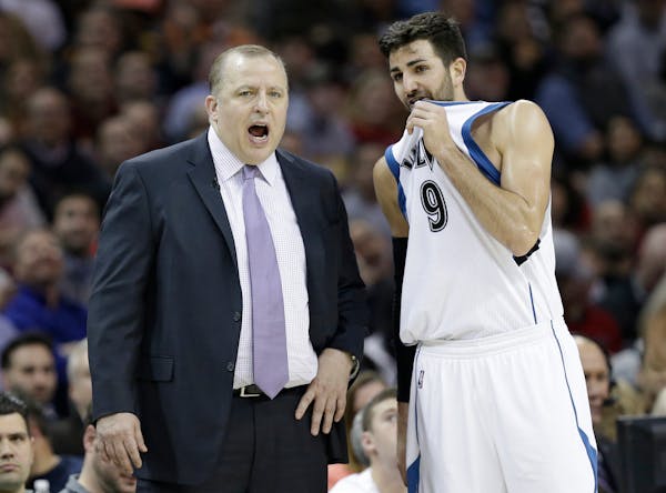 Timberwolves coach Tom Thibodeau, left, talks with Ricky Rubio early last month.