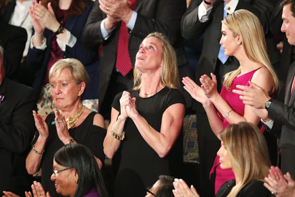 Widow of Navy SEAL emotional at Trump speech