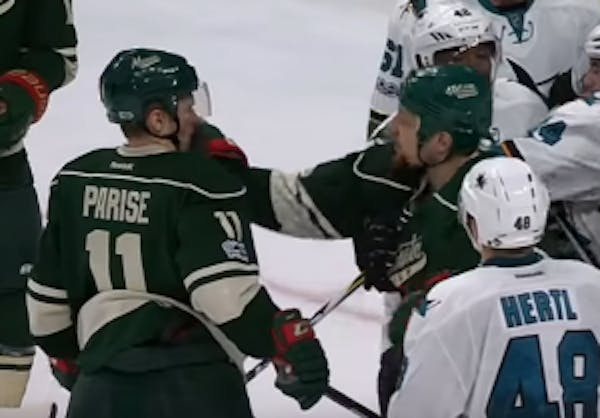 Here's the Wild's Stewart accidentally punching Parise in face