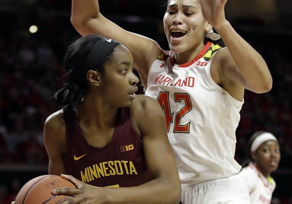 Freshman forward Taiye Bello of the Gophers was pressured by Maryland’s Brionna Jones in a road loss last Sunday.
