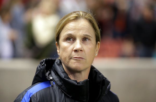U.S. coach Jill Ellis waits for the start of the team's international friendly soccer match against Switzerland on Wednesday, Oct. 19, 2016, in Sandy,