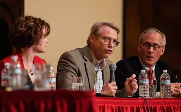 State Rep. Raymond Dehn, center, spoke at a mayoral election forum in March. Sitting besides him are incumbent Mayor Betsy Hodges and candidate Tom Ho