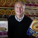 Chris Neugent, president and CEO of Post Consumer Brands, holds his favorite cereals. It has been two years since MOM Brands (Malt O Meal) merged with