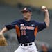 FILE - In this May 23, 2015, file photo, Illinois relief pitcher Tyler Jay delivers against Michigan during the seventh inning of a Big Ten tournament