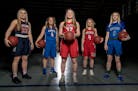 The Star Tribune All-Metro first team in girls' basketball: Tori Andrew, Orono; RaeAnnah Johnson, St. Michael-Albertville; Gabi Haack, Elk River, Temi