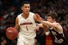 Minnehaha Academy guard Jalen Suggs (1) dribbled the ball around Crosby-Ironton High School forward Trey Jacobs (34) in the first half. ] ANTHONY SOUF