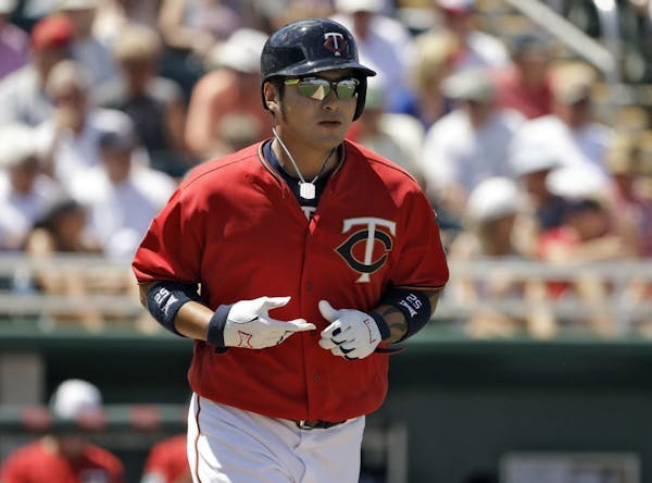 Minnesota Twins' Byung Ho Park walks against the Tampa Bay Rays during the fifth inning of a spring training baseball game Tuesday, March 28, 2017, in