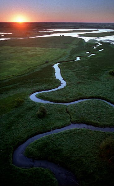 The Minnesota River winds through Big Stone National Wildlife Refuge, which contains more than 6,000 acres of grassland.